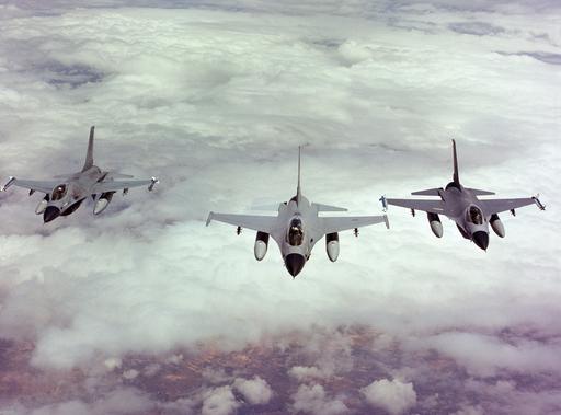 An air-to-air front view of three F-16 Fighting Falcon… — NARA and ...