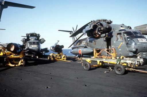 Two RH-53D Sea Stallion helicopters parked on the flight… — NARA and ...