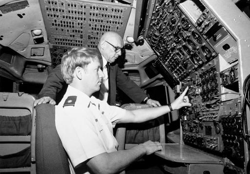 Major (MAJ) Andrew J. Courtice, seated, and Dick Gieselhart both of the ...