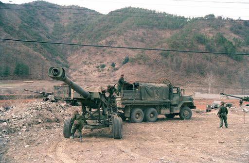An M-198 155mm howitzer of the 8th Field Artillery… — NARA and