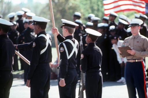 Navy Junior ROTC color guard members are evaluated by a US Marine ...