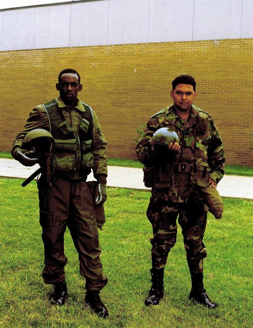 Members of an armored unit model their uniforms at Skidgel… — NARA 