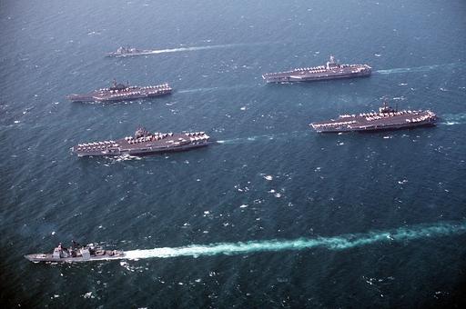 A port view of ships comprising Battle Force Zulu on their… — NARA