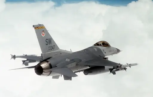 A US Air Force (USAF) F-16DJ Fighting Falcon aircraft from… — NARA