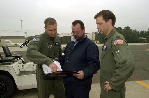 US Air Force (USAF) Pilots and a Civilian maintenance mechanic review ...
