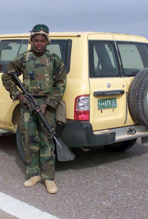 Armed with his Colt 5.56mm M16A2 Assault Rifle, a US… — NARA and