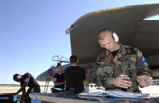 U.S. Air Force weapons loaders, from the 95th Aircraft Maintenance Unit ...
