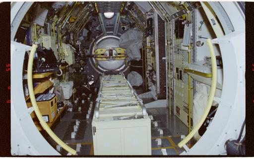 STS083-307-033 - STS-083 - Dark view of the interior of the Spacelab ...