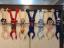 A wall with a bunch of wooden spoons hanging on it. Decoration hand made aborigines, backgrounds textures.