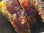 A close up of a bunch of food on a table. Soil honey the original ecology natural.