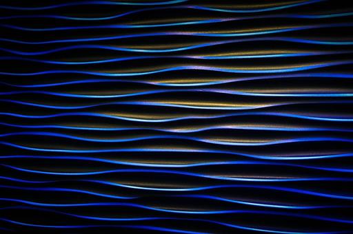 A close up of a wave pattern on a wall. Waves texture sea water ...