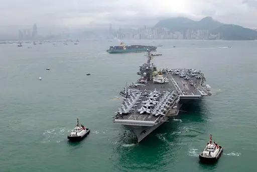 The aircraft carrier USS Kitty Hawk (CV 63) prepares to… — PICRYL