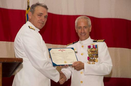 Rear Adm. Rick Williamson, left, Commander, Navy Region Europe ...