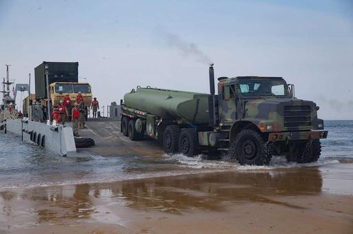 A U.S Marine Corps M970 semi-trailer refueling drives off… — PICRYL ...