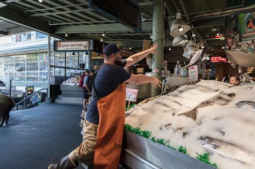 There's arguably nothing more original and entertaining than fish throwing there the Seattle Bloggers Web site has proclaimed. That's open to debate, but there's no doubt that the tosses of freshly caught fish to each other and even paying customers draws a big crowd at the city's public market, fish, throwing, pike place market, seattle, market, seafood, tourism, fishmongers