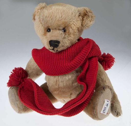Steiff Teddy Bear - A brown teddy bear wearing a red scarf - PICRYL ...