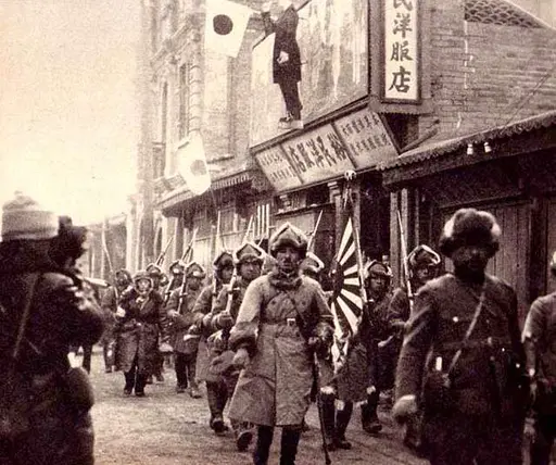 Japanese soldier with flags in December 1937 detail, front