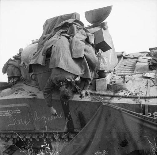 Dead soldier on tank - A black and white photo of a tank - PICRYL ...