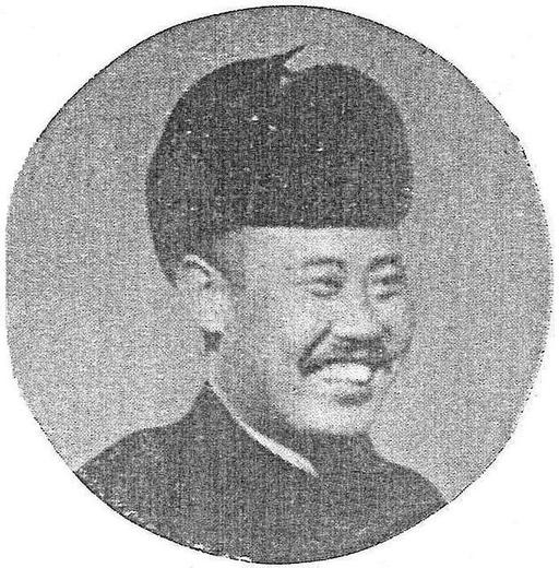 Fu Zuoyi - A black and white photo of a man wearing a hat — PICRYL
