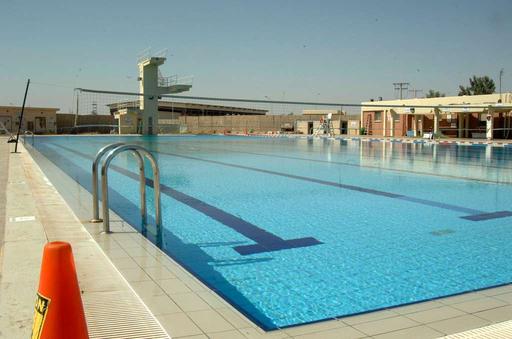 The outdoor swimming pool at Joint Base Balad, Iraq, — NARA and DVIDS ...