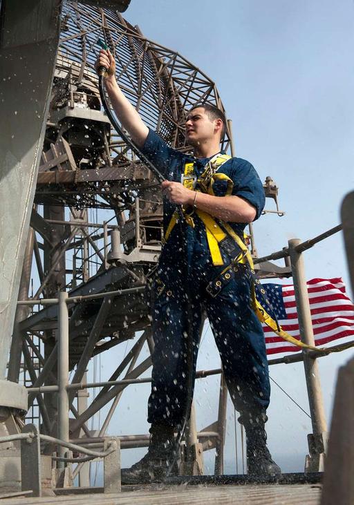 Fire Controlman 3rd Class Andrew Leigh washes a MK — PICRYL - Public ...