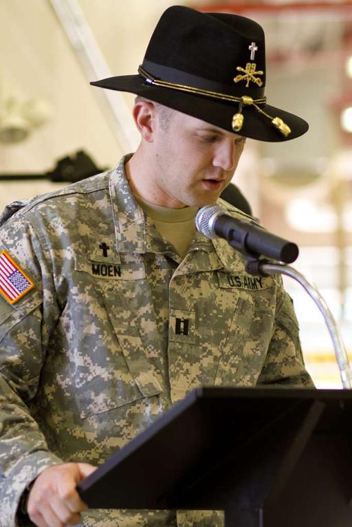 Dan Moen, chaplain, offers an invocation during a change — NARA and ...