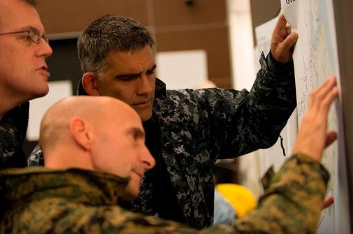 Clockwise from left, U.S. Navy Capt. Bob Carey, the — PICRYL - Public ...