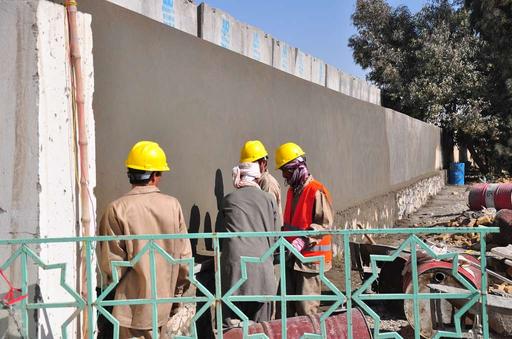 Local Afghan contractors work at the construction site - PICRYL ...