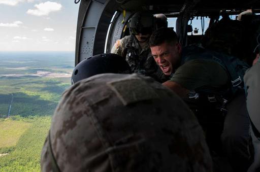 A U.S. Marine Corps jump master, with the 4th Air Naval - PICRYL ...