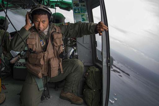 Maj. Zensaku Munn, 374th Operations Support Squadron — NARA and