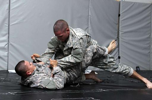 Sgt. Eric Rennert works on passing the guard against — NARA and DVIDS ...