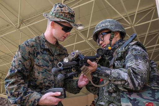 U.S. Marine Corps Lance Cpl. Thomas Harding shows a — NARA and DVIDS ...