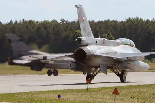 A US Air Force (USAF) F-16DJ Fighting Falcon aircraft from… — NARA