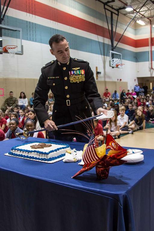 Lt. Col. Joshua A. Riggs cleans his sword during a - PICRYL - Public ...
