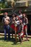 Aboriginal people pose for a picture after performing