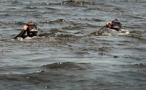 Two U.S. Border Patrol BORSTAR divers surface after — NARA and DVIDS ...