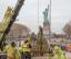 Workers move original torch of Statue of Liberty
