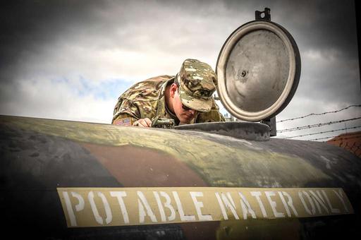 A U.S. Army service member assigned to Joint Task — NARA and DVIDS ...