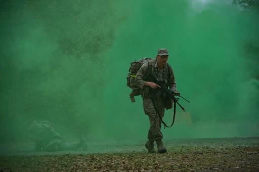 An Airman treks through smoke during a Pre Ranger Assessment — NARA and ...