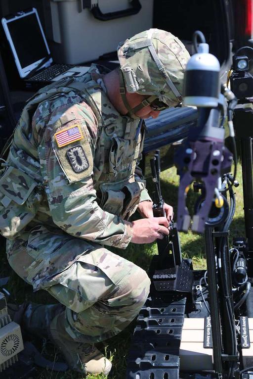 U.S. Army Staff Sgt. Thomas Clark, assigned to the - NARA & DVIDS ...