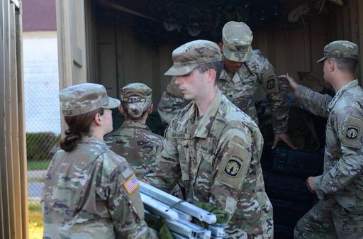Soldiers from the 503rd Military Police Battalion, — NARA and