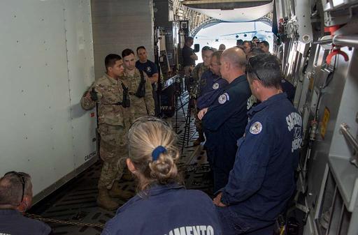 U.S. Air Force Senior Airman Edward Colvin, left, 60th — NARA and DVIDS ...