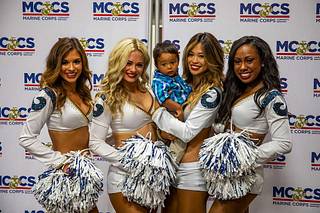 Los Angeles Rams cheerleaders pose with a child during - NARA & DVIDS  Public Domain Archive Public Domain Search