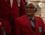 U.S. Army Air Force Sgt. Thomas Newton sits with members