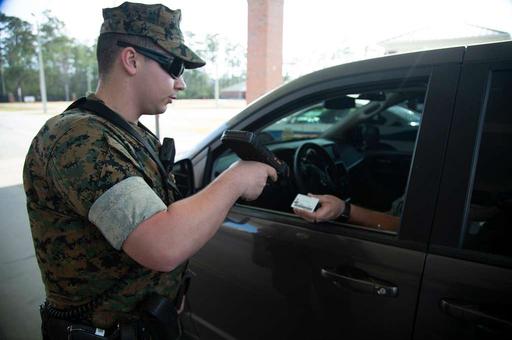 A U.S. Marine Corps gate sentry demonstrates how sentries - NARA ...