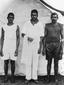 Three Aboriginal Australian men posing outside a tent, Durundur reserve, circa 1902