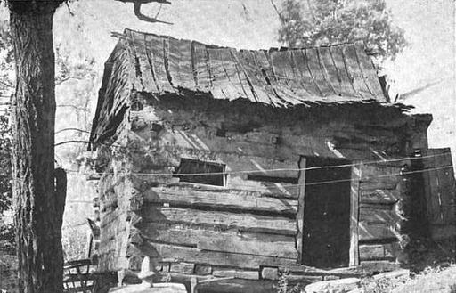 Old McMillan original - A black and white photo of a log cabin, abraham lincoln, log cabin, birthplace, kentucky, historic site, pioneer home, 19th century, frontier architecture, sinking spring farm, american history