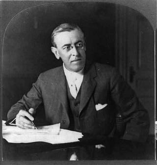 Pres. Woodrow Wilson at his desk, Washington, D.C.