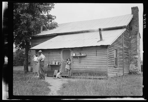 Tobacco sharecropper and his family at the back of their house showing  kitchen door, household equipment, foot path to barn. Person County, North  Carolina - PICRYL