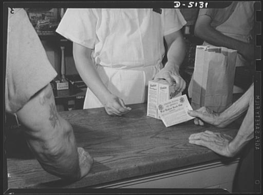 Sugar rationing. Fair exchange for all Americans. Coupons from the war ...